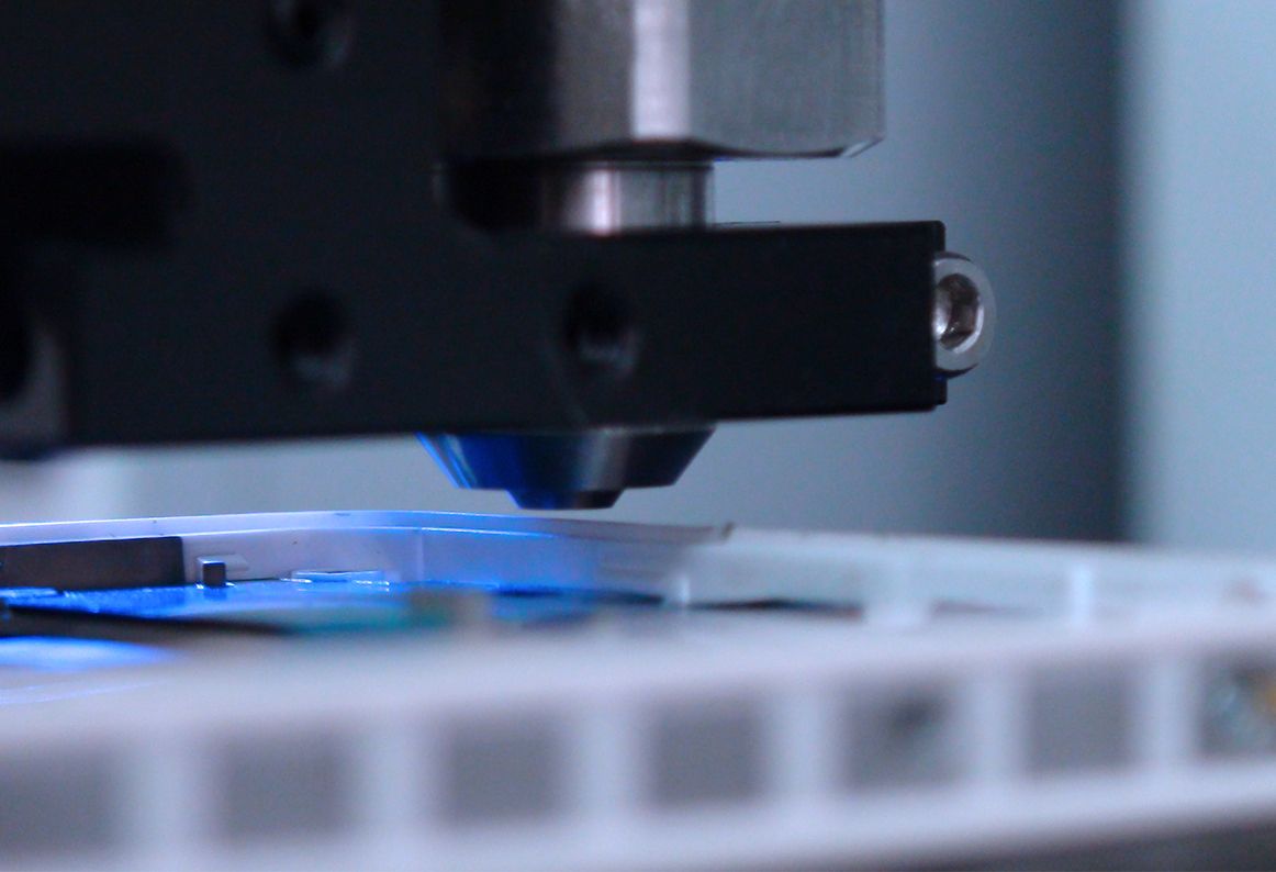 Dispensing Adhesive within a Middle Frame